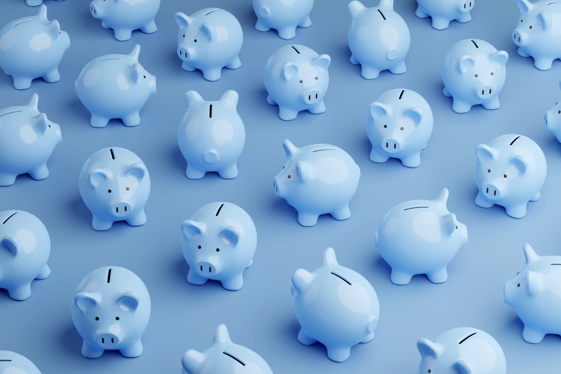Pink blue piggy banks randomly placed on blue background. Illustration of the concept of personal savings and financial investment